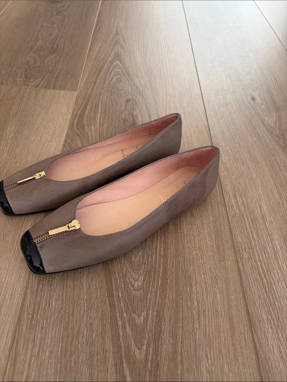 French Sole Taupe Leather Ballet Flats with Black Toe Cap and Gold Zipper
